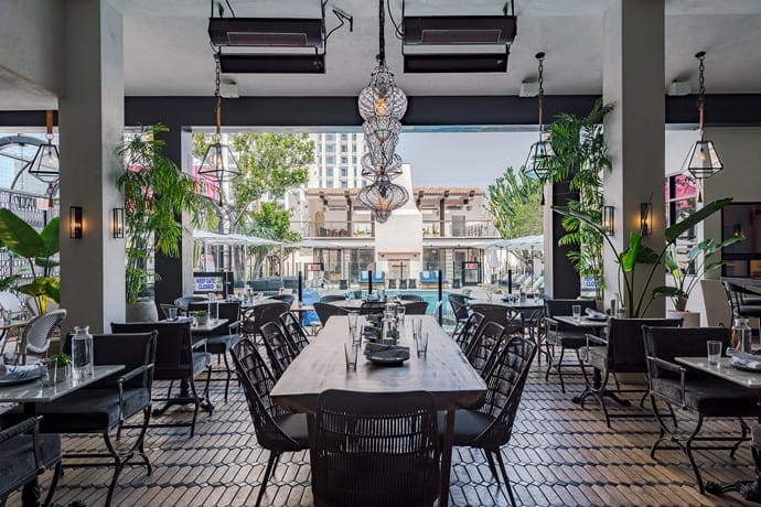 An Oasis of Whole Fish, Aperol Spritzes and Pool Hijinks in a Downtown Legend